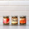 Eleven Madison Home seasonal granola jars side by side, maker photo