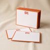 Bisous Bisous letterpress flat notecards by Dahlia Press on a natural cotton backdrop