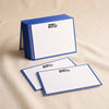 Merci Beaucoup letterpress flat notecards by Dahlia Press on a natural cotton backdrop