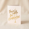 This Calls For Champagne letterpress greeting card by Dahlia Press standing on a natural cotton backdrop
