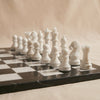 Marble Chess Set in black and white marble by MarbleCultures, close detail of the carved pieces, MA VIE studio