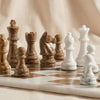 Marble Chess Set in brown and white marble by MarbleCultures, close detail of the carved pieces, MA VIE studio
