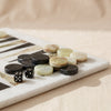 Marble Backgammon Set in green onyx and black by MarbleCultures, close detail of the stone checkers, MA VIE studio