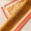 Manor Lane napkin turned back to show the damask design woven on both faces