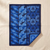 Yukata jacquard tea towel by Le Jacquard Français in indigo and cobalt, on the MA VIE cotton backdrop