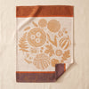 Thanksgiving jacquard tea towel by Le Jacquard Français, a wreath of autumn produce and a lattice pie, on the MA VIE cotton backdrop