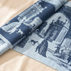 Versailles jacquard damask folded back to show the same garden scene woven on the reverse in the opposite colourway