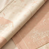 Noël au Chalet jacquard damask folded back to show the same chalet and snowflakes woven on the reverse in the opposite colourway