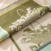 Potager d'Hiver jacquard damask folded back to show the same vegetable basket woven on the reverse in the opposite colourway