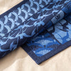 Yukata jacquard damask folded back to show the same fan, bird and medallion panels woven on the reverse in the opposite colourway