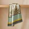 Potager d'Hiver jacquard tea towel draped over an oak edge, showing how the cloth hangs
