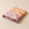Calendrier 2027 jacquard tea towel folded, showing the weight and thickness of the cloth