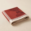 Médicis jacquard tea towel folded, showing the weight and thickness of the cloth