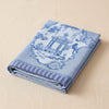Promenade Impériale jacquard tea towel folded, showing the weight and thickness of the cloth