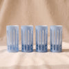 Empire Nips Glasses in Glacier, set of four mouth-blown two ounce tumblers by Sir/Madam, on a natural cotton backdrop