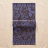 Sulawesi jacquard table runner in Terre Indigo, doubled back on the MA VIE cotton backdrop to show its full length