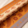 Manor Lane runner turned back to show the same design woven on the reverse in the opposite colourway