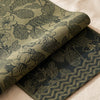 Sulawesi runner in Canopée turned back to show the same foliage woven on the reverse in the opposite colourway