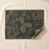 Sulawesi Fleurs coated placemat by Le Jacquard Français on the MA VIE cotton backdrop