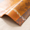 Manor Lane placemat corner in close detail, showing the woven design and the wipeable coated surface