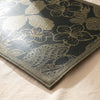 Sulawesi Fleurs placemat corner in close detail, showing the woven flowers and the wipeable coated surface
