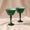 Rialto Coupe Glasses in Kale, set of two mouth-blown cased glass coupes by Sir/Madam, on a natural cotton backdrop