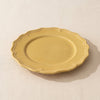 Dijon yellow stoneware dessert plate by Novastyl, seen from above on the MA VIE cotton