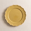 Dijon yellow stoneware dinner plate by Novastyl, seen from above on the MA VIE cotton