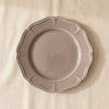 Lavender stoneware dessert plate by Novastyl, seen from above on the MA VIE cotton