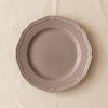 Lavender stoneware dinner plate by Novastyl, seen from above on the MA VIE cotton
