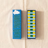 Wooden tumbling tower Junior by Printworks, lid beside the packed wooden blocks on the MA VIE cotton backdrop