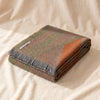 Fringed Baby Alpaca Throw in Hunter and Orange by Alicia Adams Alpaca, folded