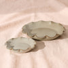 Scalloped Stoneware Trays by Accent Decor, small 11.75 inch and large 18.25 inch, speckled greige reactive glaze with a ruffled rim