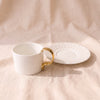 Fork Handle Cup and Saucer by Twig NY, MA VIE studio, cup beside saucer