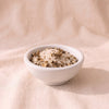 Mushroom Sea Salt by Beautiful Briny Sea, MA VIE studio, salt in a white dish showing foraged mushroom pieces