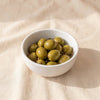 Clemente Bar Marinated Olives by Eleven Madison Home, MA VIE studio, served in a white dish