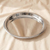 Orlando stainless steel round tray with beaded edge on MA VIE cotton