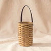 Millstream Home hanging basket, handwoven seagrass and leather wall basket with brass hardware, on MA VIE cotton