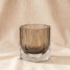 Faceted glass ice bucket in smoky hazel on natural cotton