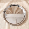 Marlene stainless steel round tray seen from above on MA VIE cotton