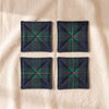 Millstream Home Black Watch tartan coasters, all four laid flat, on MA VIE cotton