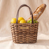 Millstream Home small market basket filled with a baguette, lemons and grapes, on MA VIE cotton