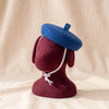 Dog Beret in cobalt blue felt shown worn, by Woofcessories