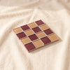 Glass tile coaster in Aged Wine, wine red and amber checkerboard, by Subtle Art Studios