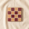 Glass tile coaster in Aged Wine seen from above, by Subtle Art Studios
