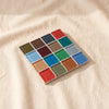 Glass tile coaster in Autumn Sprinkles, olive rust navy and red, by Subtle Art Studios
