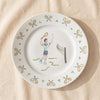 Tennis gentleman dinner plate with hand painted player and crossed racquet border, by Duggan Society