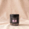 Lakrids F Dark and Sea Salt dark chocolate-coated licorice in its black tub, by Lakrids by Bülow