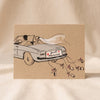 Getaway Car Wedding Card by Ula Bloom on a natural cotton backdrop