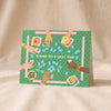 Lucky Year Mahjong Card by Ula Bloom on a natural cotton backdrop